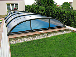 Pool cover ELEGANT with a side entrace for easy entrace to the pool 