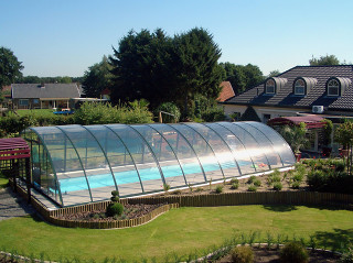 Swimming in pool covered by RAVENA cover