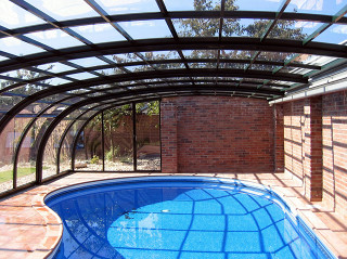 Pool enclosure STYLE protects your pool and keeps it cleaner