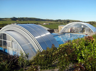 Pool covered with enclosure UNIVERSE NEO can be used also in bad weather