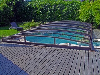 Copertura per piscine apribile in finitura bronzo