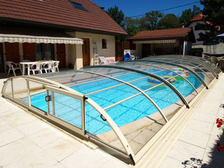 coperture telescopiche per piscine con la porta laterale