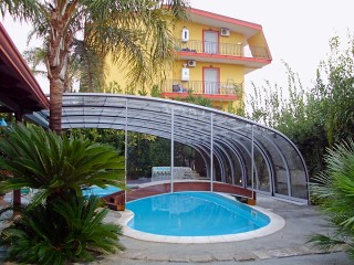 Forma atipica di copertura piscine modello Style