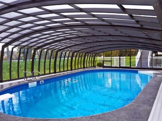 Retractable pool enclosure Omega offers a lot of free space around your pool