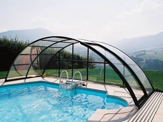 Retractable pool cover UNIVERSE allowes you to use pool even in bad weather