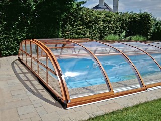 Closer look on pool enclosure Elegant NEO with wood imitation