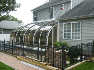Retractable  innovative conservatory - patio enclosure CORSO Entry 