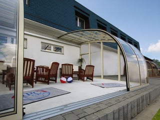 Innovative conservatory idea - retractable patio enclosure CORSO Entry