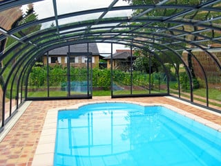 Blue polycarbonate filling used on swimming pool enclosure