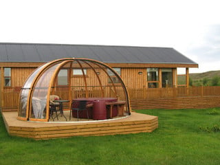 Pool enclosure ORIENT with woold-like imitation used on its frames