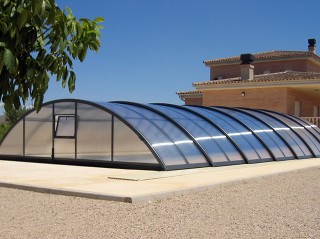 Retractable swimming pool enclosure Universe with anthracite finish 