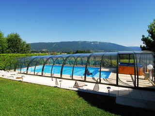 copertura telescopica per la piscina medio alta in colore legno