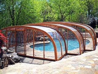 Atypical shape of pool enclosure Laguna NEO with wood imitation finish