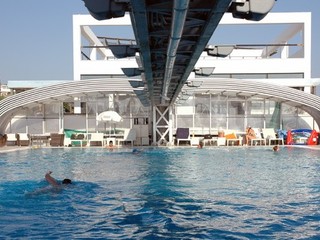 Retractable pool enclosure for public swimming pool 16