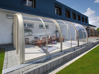 High patio enclosure CORSO Entry with crystal clear polycarbonate filling