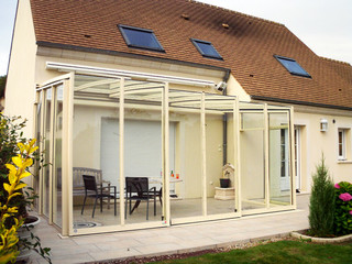 Retractable patio enclosure CORSO GLASS