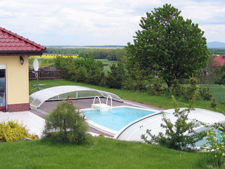 Low swimming pool cover ELEGANT NEO™ will not break whole impression of your garden