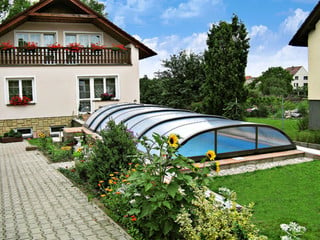 Swimming pool enclosure ELEGANT can also be used on public pools
