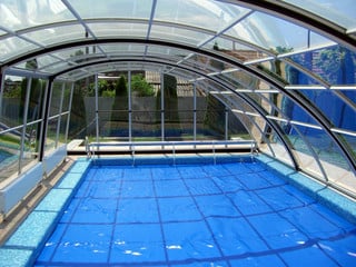 Inground pool enclosure RAVENA made by Alukov