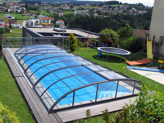 Typical rectangle pool covered by ELEGANT pool enclosure