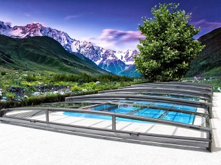 Retractable swimming pool enclosure Viva with magnificant view on the mountains