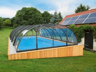 Front view on swimming pool enclosure Tropea NEO with transparent polycarb