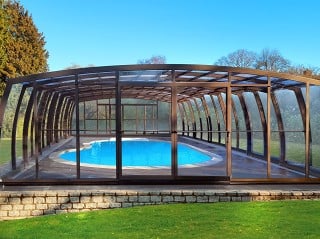 Fully closed pool enclosure Omega with brown finish