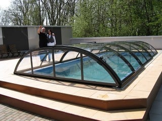Happy customers rejoice of their new pool enclosure Elegant