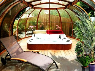 Look into hot tub enclosure Oasis attached to the wooden cabin - wood imitation profiles