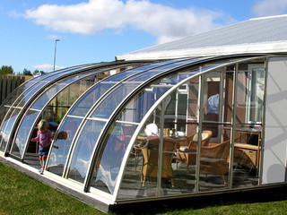 Retractable  innovative conservatory - patio enclosure CORSO Entry 