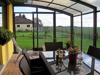 Patio enclosure CORSO Solid can also cover your sitting set - look inside