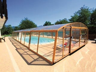 Retractable swimming pool enclosure Venezia with wood imitation finish
