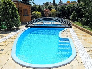 Swimming pool enclosure Imperia with atypical shape of pool