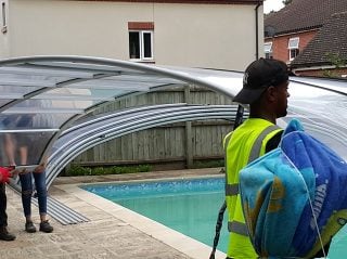 Swimming pool enclosure installation