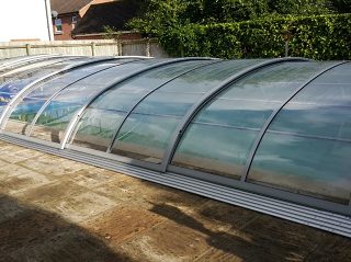 Swimming pool enclosure installation