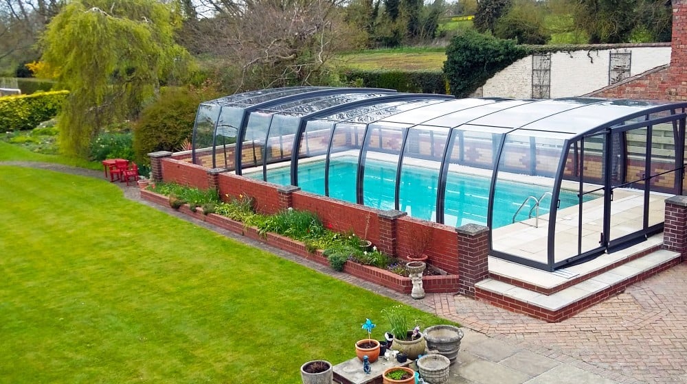 Pool enclosure OMEGA - retractable pool cover | sunrooms-enclosures.com