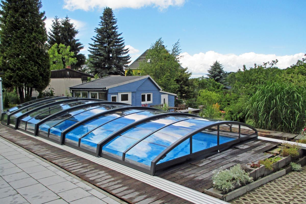 Medium retractable pool enclosures and pool covers sunrooms