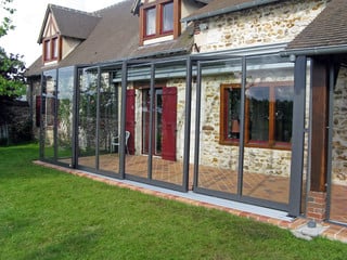 Horeca enclosure Corso Glass - retractable patio enclosure for hotels, restaurants and cafes