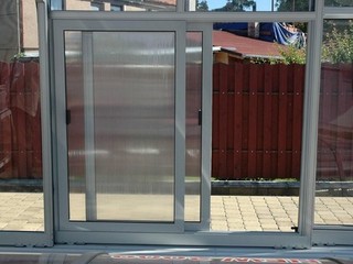 Inner door in middle -segment for pool and patio enclosures
