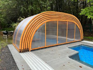 Laguna pool enclosure with wooden decor
