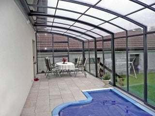Retractable patio enclosure CORSO Premium works twice - patio enclosure and pool enclosure