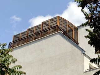 Patio enclosure for luxury suite on the roof-top