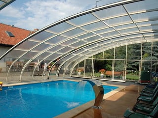 Pool and patio enclosure Style - over the patio and pool - that is the duty for this enclosure