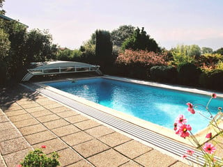 Swimming pool enclosure ELEGANT can also be used on public pools