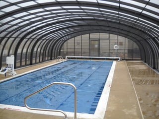 Pool enclosure LAGUNA - a commercial application over hotel pool