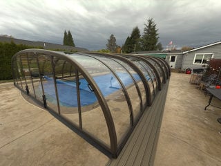 Pool enclosure Laguna Type V protects your pool all year round