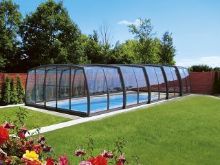 Pool enclosure Omega looks great in a spacious garden