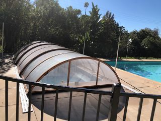UNIVERSE enclosure model over endless swimming pool