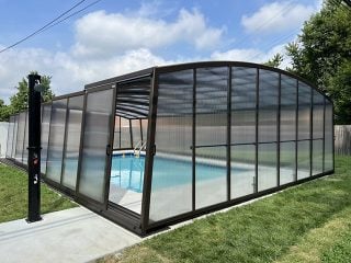 Pool enclosure Venezia with opened side wall doors