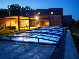 Romantic night scenery with the VIVA™ pool enclosure